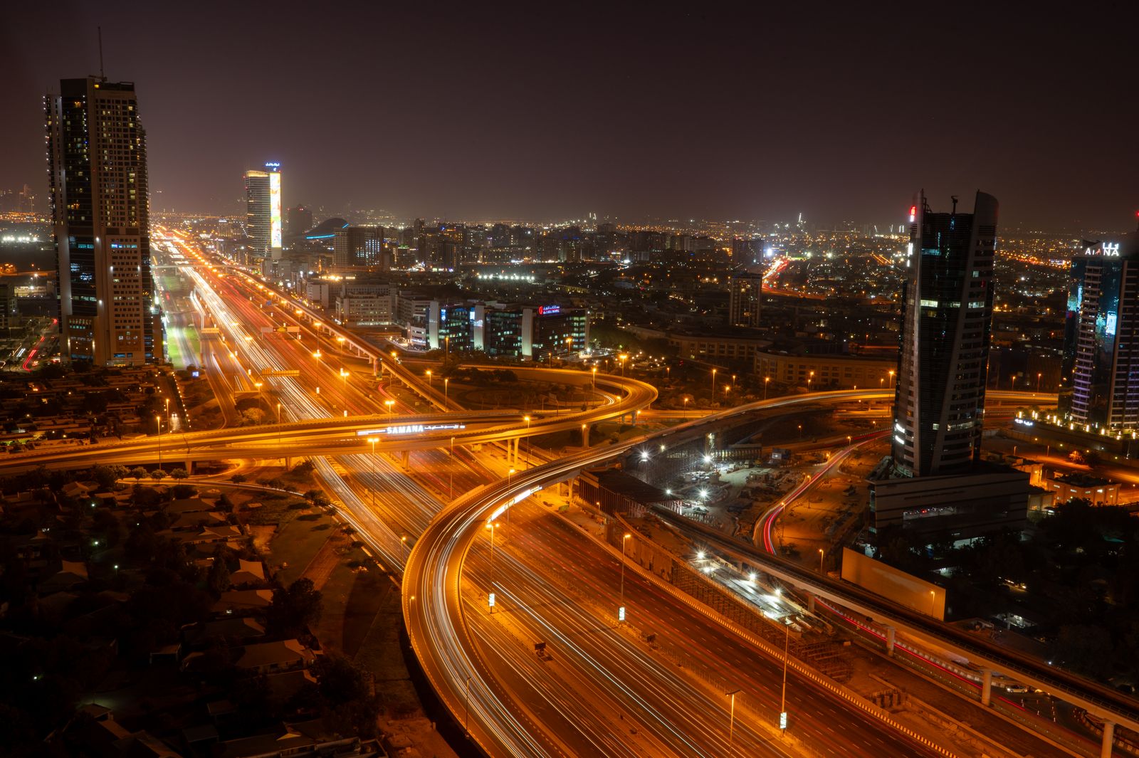 Photo: Irshad Ahmad / Pexels Aerial view of the illuminated Dubai skyline at night